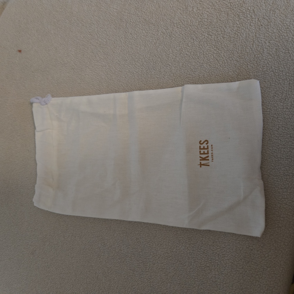 TKEES Cream Drawstring Pouch For Sandals.